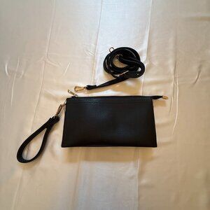 Black pebbled faux leather clutch with wrist and crossbody strap, gold hardware